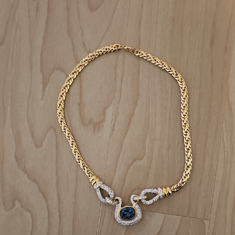 Elegant Gold and Silver Necklace with Blue Gemstone